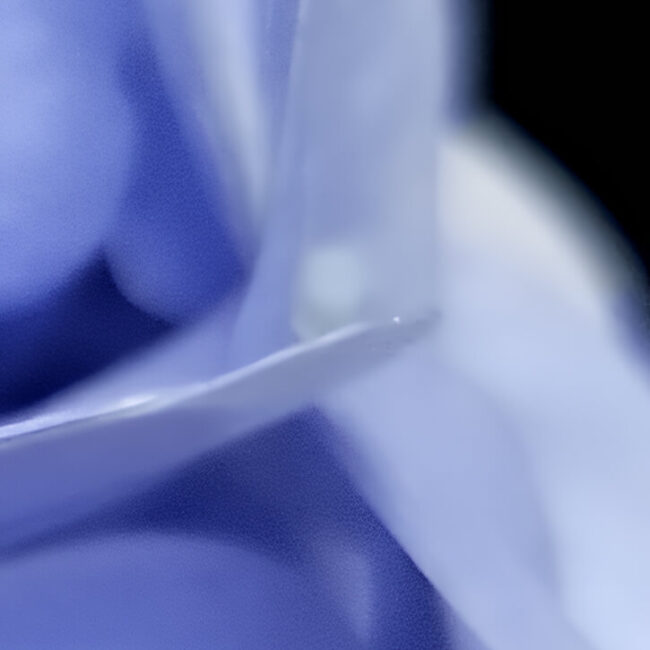 Ethereal nature photo capturing the spiritual quality of a blue and purple flower with soft, folded textures.